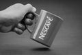 Promotional red Nescafe mug on Black and White