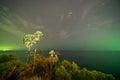 Promthep Cape viewpoint at night with stars and space in universe, Andaman sea in Phuket Island, tourist attraction in Thailand in Royalty Free Stock Photo