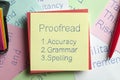 Proofread written on a note