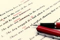 Proofreading of English sentences on white paperwork Royalty Free Stock Photo