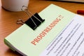 Proofreading red word on green sheet Royalty Free Stock Photo