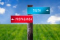 Propaganda or Truth - Traffic sign with two options. Royalty Free Stock Photo