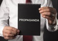 Propaganda word. Manipulation and brainwash by government concept Royalty Free Stock Photo