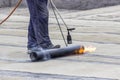 Propane blowtorch at floor slab insulation work Royalty Free Stock Photo