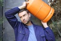 Propane tank delivery man with attractive look Royalty Free Stock Photo