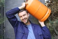 Propane tank delivery man with attractive look Royalty Free Stock Photo