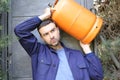 Propane tank delivery man with attractive look Royalty Free Stock Photo