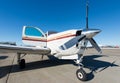 Propeller aeroplane standing on asphalt