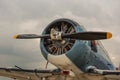 Propeller aircraft on the background of a stormy sky