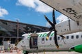 Propeller airplane provisioning on the runway of Los Rodeos airport