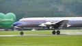 Propeller four-engine airliner from the 1950s landing Royalty Free Stock Photo