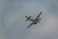 Propeller plane flying at cloudy sky, samborondon, ecuador