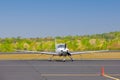 Propeller plane parking at the airport on a sunny day Royalty Free Stock Photo