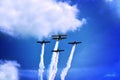 Propeller planes skywriting at an airshow Royalty Free Stock Photo