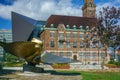 Propeller sculpture with the old vs new university building Royalty Free Stock Photo