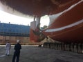 Propeller of the ship ,five blades, and rudder repairing, cleaning and painting during dry dock.