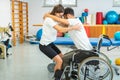 Proper lifting technique from a wheelchair Royalty Free Stock Photo