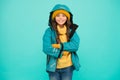 Properly equipped. Ski resort concept. Winter collection. Child wear hat and jacket. Active leisure. Sporty style. Girl