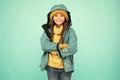 Properly equipped. Ski resort concept. Winter collection. Child wear hat and jacket. Active leisure. Sporty style. Girl