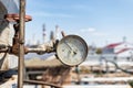 Properly working pressure gauge installed on the pipeline at the old chemical plant Royalty Free Stock Photo