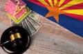 Property auction, flag Arizona, gavel wooden and model house on wooden background, lawyer of home real estate Royalty Free Stock Photo