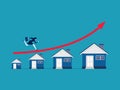Property growth. Businesswoman running on the home growth graph.