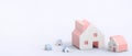 Property industry growth Concept and Red small Housing Family on purple background. copy space, banner, website