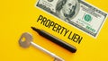 Property lien is shown using the text as financial concept Royalty Free Stock Photo
