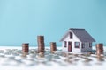 Property tax.investment planning.business real estate. View Of coin stack with house model, mortgage loading real estate property Royalty Free Stock Photo