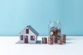 Property tax.investment planning.business real estate. View Of coin stack with house model, mortgage loading real estate property Royalty Free Stock Photo