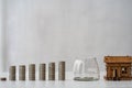 Property tax and market growth coins with stacks of coins on wooden table to show savings. Family plan. House. Loan Royalty Free Stock Photo