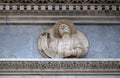 Prophet Amos, relief on the portal of the Cathedral of Saint Lawrence in Lugano