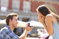 Proposal in the street man asking marry to his girlfriend Royalty Free Stock Photo