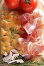 Prosciutto baked pizza dough with tomato and mozza Royalty Free Stock Photo