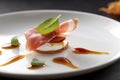 Prosciutto and goat cheese appetizer on a plate Royalty Free Stock Photo