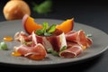 Prosciutto and goat cheese appetizer on a plate Royalty Free Stock Photo