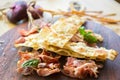 Prosciutto ham and grissini bread sticks. italian antipasto. Shallow dof.