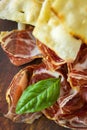 Prosciutto ham and grissini bread sticks. italian antipasto. Shallow dof.