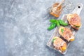 Prosciutto peach bruschetta. Crostini, cream cheese, basil, peach and prosciutto, horizontal, top