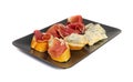 Prosciutto Tapas and Mold Cheese on Black Plate, Spanish Jamon Slices, Parma Ham, Sliced Serrano, Iberico Royalty Free Stock Photo