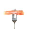 Proscuitto ham on a fork Royalty Free Stock Photo