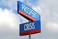 Prosperity and crisis - street sign, sky in background Royalty Free Stock Photo