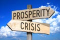 Prosperity, crisis - wooden signpost Royalty Free Stock Photo