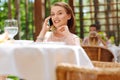 Prosperous businesswoman calling her partner