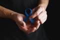 prostate cancer ribbon, colon cancer concept, blue ribbon