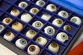 Prosthetic eyes with pupils of different colors on the stand