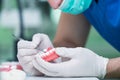 Prosthetics hands while working on the denture. Royalty Free Stock Photo