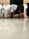 prostrate in the mosque