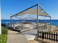 Protaras. Famagusta area. Cyprus. An observation deck on the shores of the Mediterranean Sea, where a group of people practice