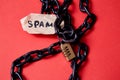 Protect from junk mail or spam e-mail and unsolicited letter. The word spam and the lock on the chain Royalty Free Stock Photo
